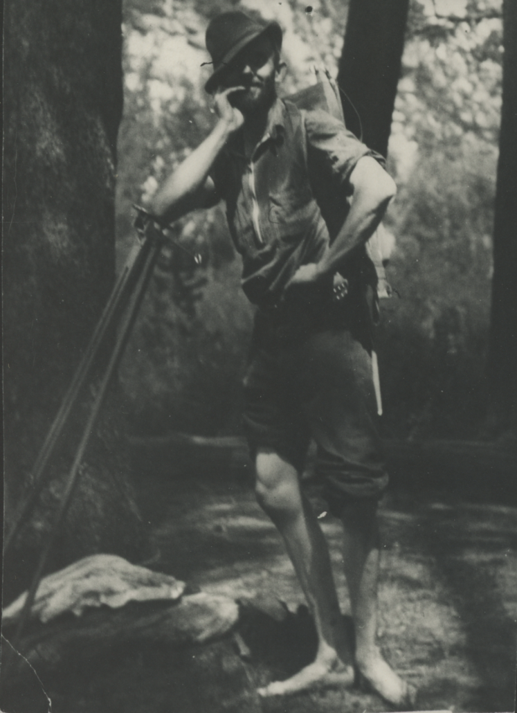 Ansel Adams leaning on tripod, bare feet, photograph by Cedric Wright ca. 1930 Ansel Adams leaning on tripod, bare feet, photograph by Cedric Wright ca. 1930